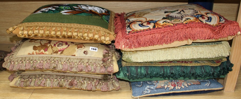 Seven antique / antique fabric cushions